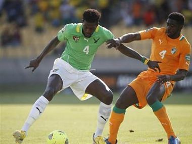 Ivory Coast's Kolo Toure challenges Togo's captain Emmanuel Adebayor during their African Nations Cup (AFCON 2013) Group D soccer match in Rustenburg. Reuters