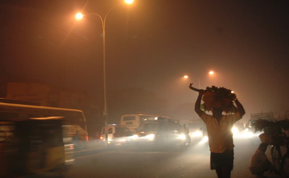 The city shrouded in smoke from burning discarded materials on The city shrouded in smoke from burning discarded materials on