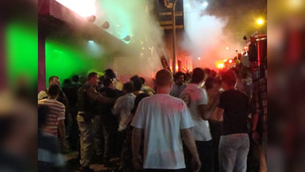 Fireworks by band blamed for fire that left 230 dead in Brazil nightclub