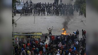 Morsi declares emergency as Egypt riots kill 49