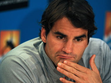 Switzerland's Roger Federer listens to a journalist's question during a press conference after defeat in his men's singles semi-final against Britain's Andy Murray on day twelve of the Australian Open tennis tournament in Melbourne on January 25, 2013. Getty Images