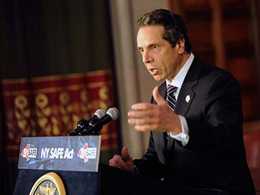 New York enacts gun-control law, first since Newtown school shooting New York enacts gun-control law, first since Newtown school shooting