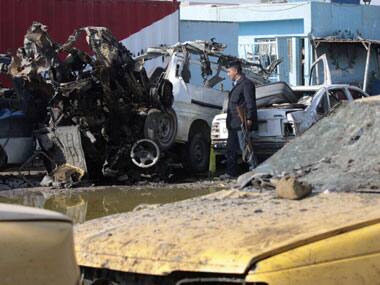 String of bomblasts in Iraq kill 22 Shiite Muslim pilgrims