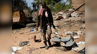 Malian forces take take control of key town after rebels retreat