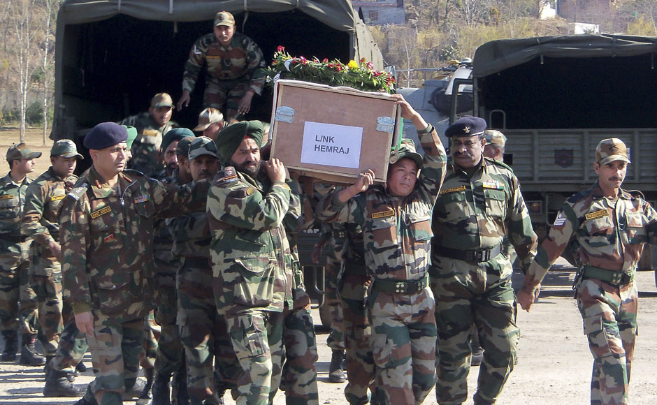 Images: Pak envoy summoned, soldiers' bodies taken home Images: Pak envoy summoned, soldiers' bodies taken home