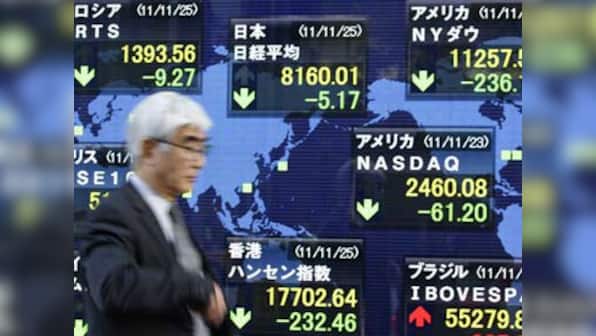 Nikkei holds near 6-year high on US data optimism
