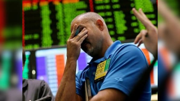 World stock markets slide after virus-driven plunge in US retail sales, factory output; dire economic outlook weighs on Asia