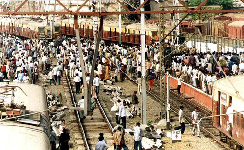 Trade union activists stop trains in central Bombay during a 24 hours strike in Maharashtra 25 April 2001. The strike, affecting the entire industrial heartland of the state of which Bombay is the capital, was enforced by a rare alliance of trade unions and parties across the political spectrum to protest against the federal government's liberal reformist economic policies. AFP Trade union activists stop trains in central Bombay during a 24 hours strike in Maharashtra 25 April 2001. The strike, affecting the entire industrial heartland of the state of which Bombay is the capital, was enforced by a rare alliance of trade unions and parties across the political spectrum to protest against the federal government's liberal reformist economic policies. AFP