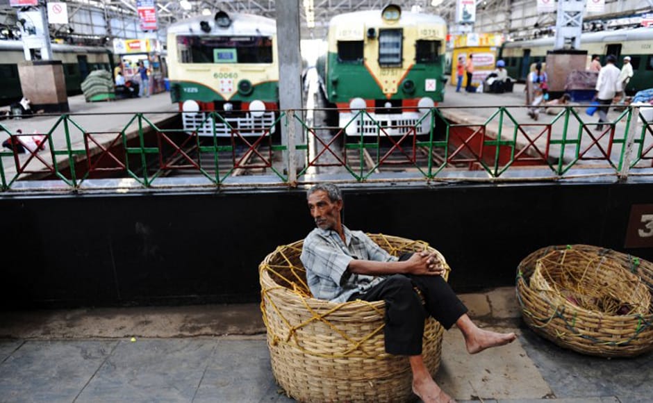A porter relaxes at a train station as commuters are stranded during Congress party supporters' 12-hour strike in Kolkata on 17 July, 2009. Normal life was disrupted across West Bengal with rail and road traffic severely affected as a 12-hour strike was called in protest against an alleged attack by Communist Party of India (Marxist) (CPI-M) supporters on Congress party state legislative members (MLAs) in Mangalkot in Burdwan district.<br />AFP A porter relaxes at a train station as commuters are stranded during Congress party supporters' 12-hour strike in Kolkata on 17 July, 2009. Normal life was disrupted across West Bengal with rail and road traffic severely affected as a 12-hour strike was called in protest against an alleged attack by Communist Party of India (Marxist) (CPI-M) supporters on Congress party state legislative members (MLAs) in Mangalkot in Burdwan district.<br />AFP