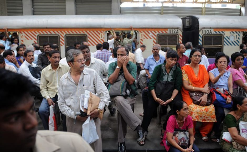 Stranded commuters are pictured at the Churchgate railway station in Mumbai on 20 July, 2012. The railway services on the western side of the city came to a near halt after a section of motormen went on strike -- just prior to evening rush hour traffic -- demanding better work conditions. AFP Stranded commuters are pictured at the Churchgate railway station in Mumbai on 20 July, 2012. The railway services on the western side of the city came to a near halt after a section of motormen went on strike -- just prior to evening rush hour traffic -- demanding better work conditions. AFP