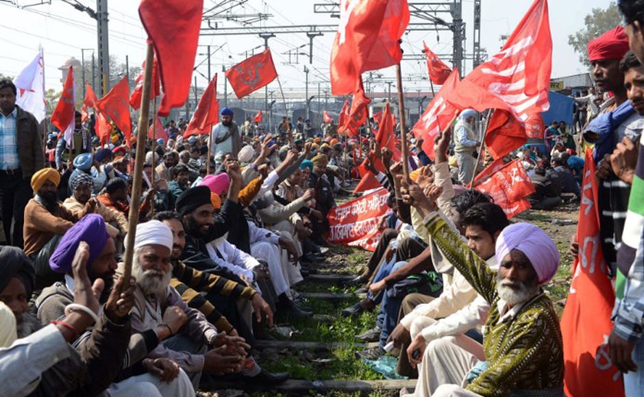 Activists from various trade unions block the tracks during a two-day strike opposing the current UPA government’s economic policies at the railway station in<br />Amritsar on 20 February, 2013. Millions of India's workers walked off their jobs in a two-day nationwide strike called by trade unions to protest at the Activists from various trade unions block the tracks during a two-day strike opposing the current UPA government’s economic policies at the railway station in<br />Amritsar on 20 February, 2013. Millions of India's workers walked off their jobs in a two-day nationwide strike called by trade unions to protest at the