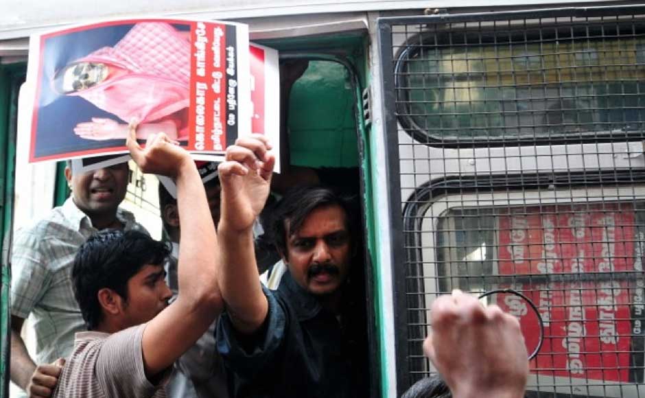 Police detaining protesters who were seeking action against the Congress for its inaction over alleged war crimes in Sri Lanka. Firstpost Police detaining protesters who were seeking action against the Congress for its inaction over alleged war crimes in Sri Lanka. Firstpost