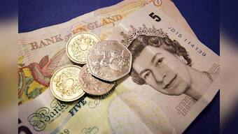 Moody's strips UK of coveted triple-A debt rating