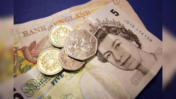 Moody's strips UK of coveted triple-A debt rating