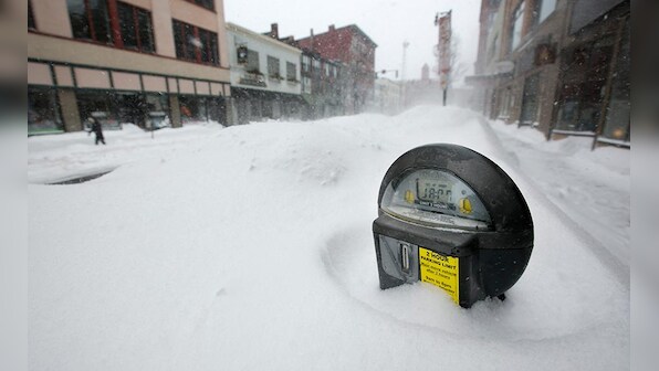 Images: Blizzard in US leaves 30 inches of snow, 700,000 homes without power
