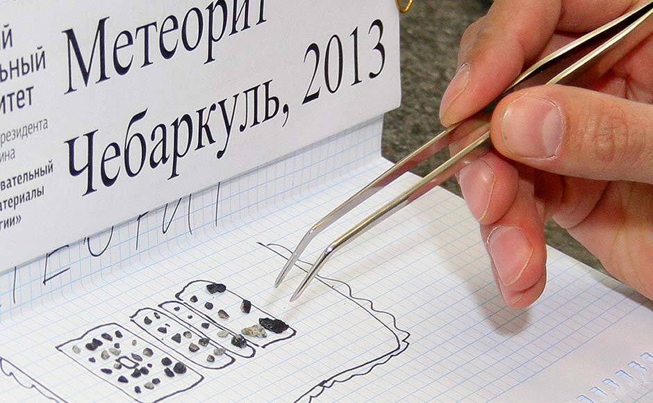 Researchers from the Urals Federal University, based in Yekaterinburg, have determined that the small stone-like pieces found near Lake Cherbarkul in the Chelyabinsk region are pieces of the meteorite. A total of 53 pieces have been brought for analysis to the university in Yekaterinburg. The Urals Federal University Press Service, Alexander Khlopotov/AP