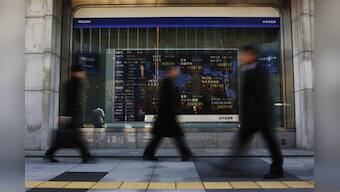 Asian shares fall on Italy poll day, may reignite euro zone crisis