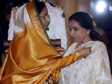 Bhosle receiving the Padma Vibhushan. AFP
