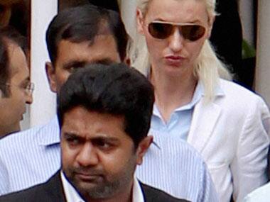 Abhishek Verma and his wife. PTI.