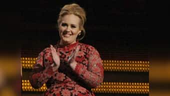 Why did Adele fight with Chris Brown at the Grammies?