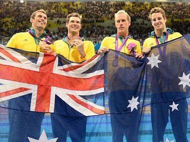 Hayden Stoeckel, Christian Sprenger, Matt Targett and James Magnussen (C) pose with their bronze medals from the men's 4x100 medley relay final at the 2012 Olympic Games. AFP