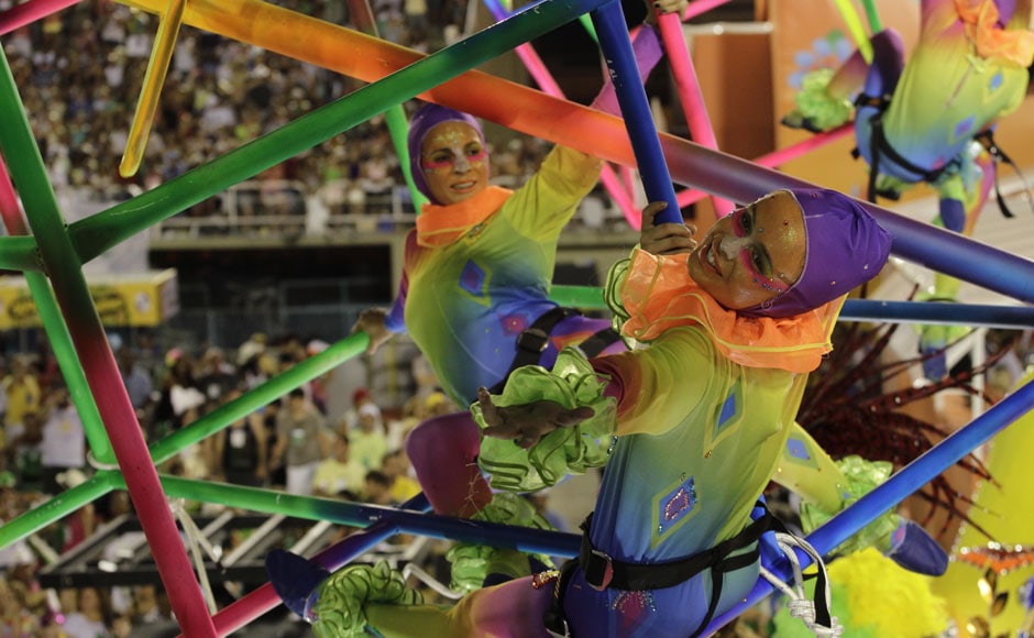 Performers from the Academicos do Grande Rio samba school parade during carnival celebrations at the Sambadrome in Rio de Janeiro on Tuesday. AP