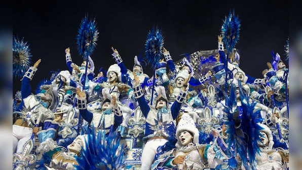 Images: Thousands party on the streets at Brazil's Rio carnival – Firstpost