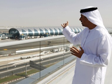 Divisional Senior Vice President of Emirates Airlines, Adnan Kazim, gestures towards the new terminal dedicated for A380 aircraft at the concourse in Dubai International Airport. Reuters