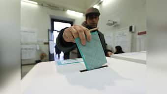Italy elections: Lower turnout marks polling day