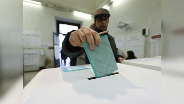 Italy elections: Lower turnout marks polling day