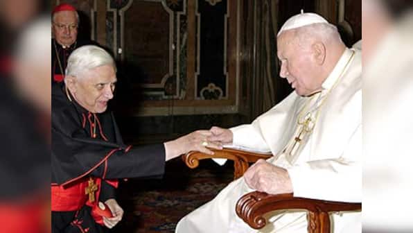 Pope Benedict avoids John Paul's show of suffering