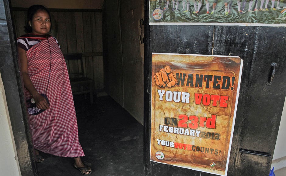 A woman, wearing traditional attire, comes out of a polling station in Byrnihat, Meghalaya after casting her vote. AP A woman, wearing traditional attire, comes out of a polling station in Byrnihat, Meghalaya after casting her vote. AP