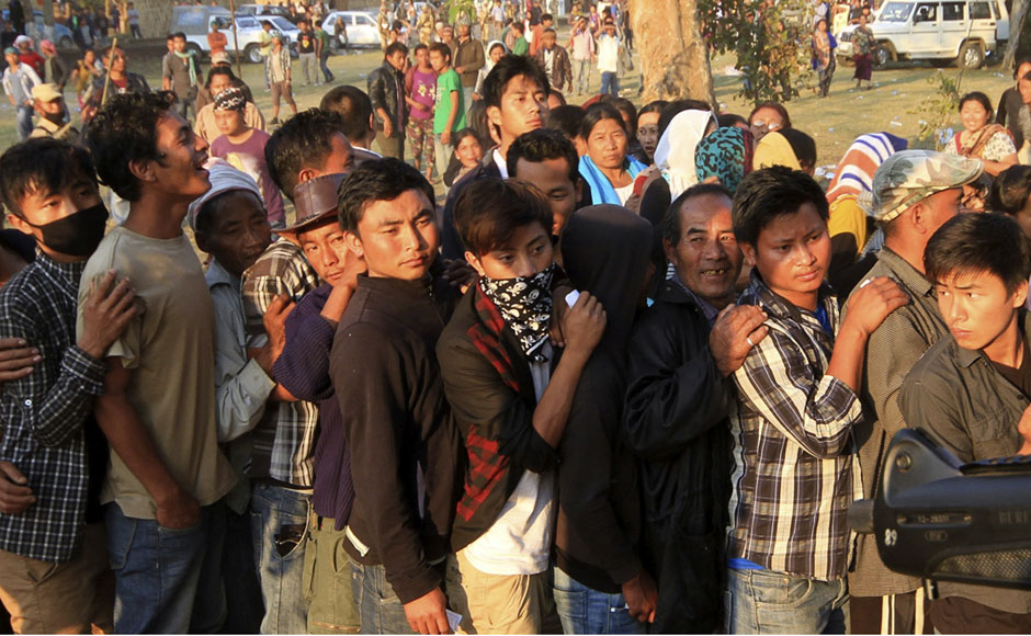 Ethnic Nagas stand in a queue to cast their votes outside a polling station in Dimapur, Nagaland. AP Ethnic Nagas stand in a queue to cast their votes outside a polling station in Dimapur, Nagaland. AP