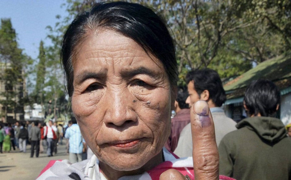 A Naga woman shows her finger marks after casting her vote for the Nagaland assembly election in Dimapur. PTI A Naga woman shows her finger marks after casting her vote for the Nagaland assembly election in Dimapur. PTI