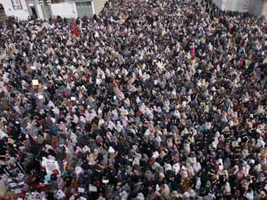 Pakistani Shiite Muslims sit in protest following Saturday's bombing which killed scores of people, in Quetta, Pakistan on Monday. AP
