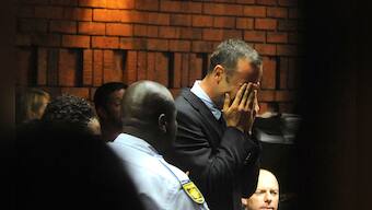 Images: Oscar Pistorius, charged with murder, weeps in court