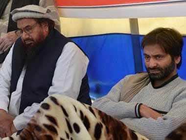 Hafiz Saeed with Yasin Malik. PTI.
