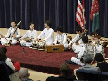 Members of the Young Afghan Traditional Ensemble perform at the State Department in Washington. Reuters