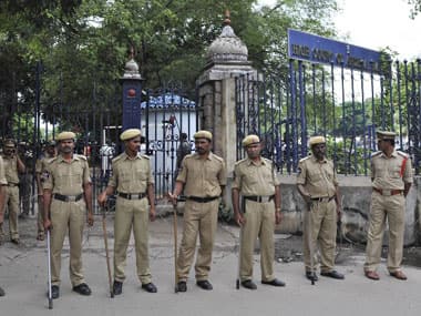 Policemen stand guard outside the Andhra Pradesh High Court. AFP