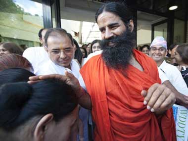 Ramdev's trust moves HC against land cancellation by HP govt Ramdev's trust moves HC against land cancellation by HP govt