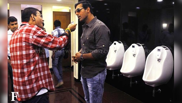 Images: John Abraham goes to press con, gets interviewed in loo!