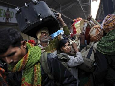 Kumbh pilgrims at the Allahabad station. AP.