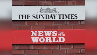 UK police arrest 6 in phone hacking probe 
