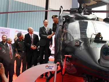 Chairman, HAL, RK Tyagi handed over the Rudra to Deputy Chief of Army Staff Lt Gen Narendra Singh in Bangalore on Friday. Image courtesy PIB