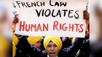 Turban ban: Sikhs urge Sushma to raise issue with French Prez