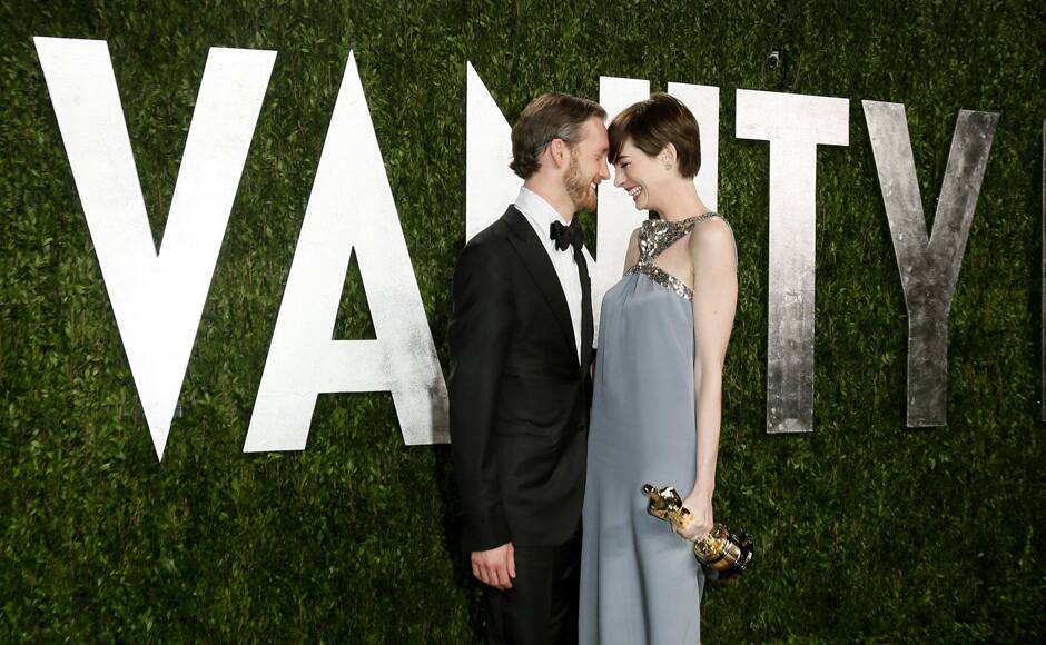 Anne Hathaway and her husband Adam Shulman attend the 2013 Vanity Fair Oscars Party in West Hollywood, California February 25, 2013. Reuters 