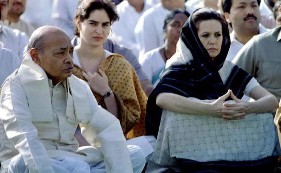 Sonia Gandhi with Congress president and Prime Minister Narasimha Rao at a prayer ceremony in 1995. Sonia had allegedly already begun playing a role in the Congress despite not being a member of the party. Reuters