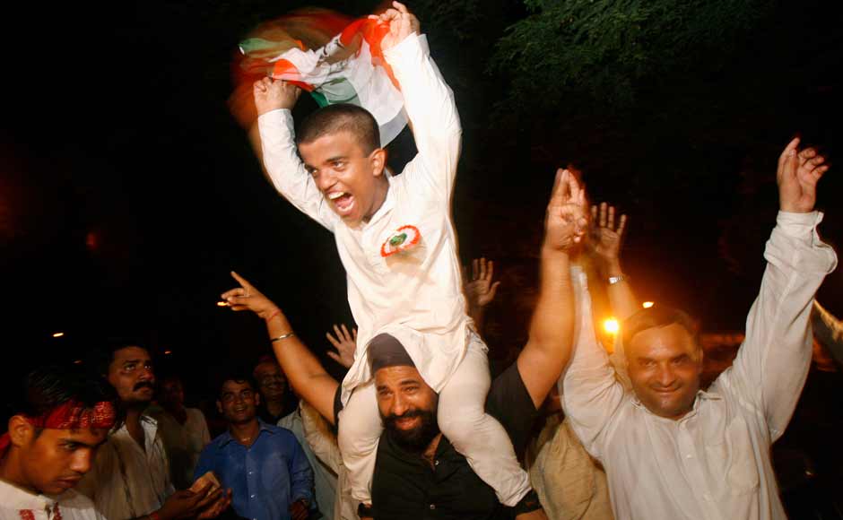 Despite the Left parties withdrawing support to the Congres led government it managed to survive its full term. Supporters of the Congress party celebrate outside the party president Sonia Gandhi's residence on July 22, 2008. Reuters