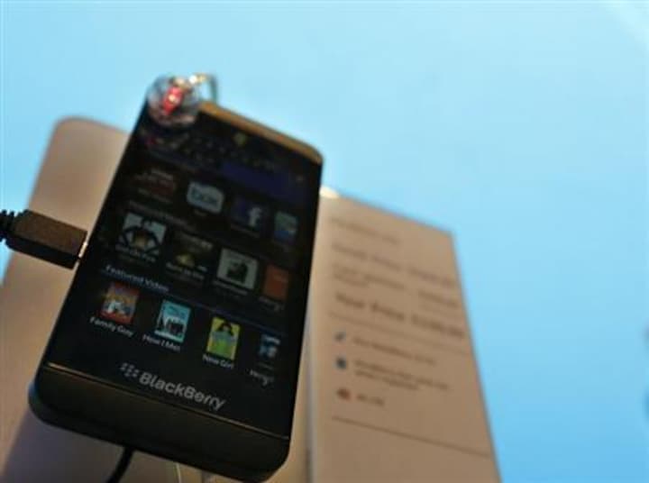 BlackBerry posts surprise profit, but subscribers slip