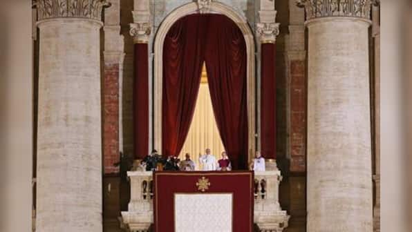 Pope Francis delivers first blessing, asks world for prayers